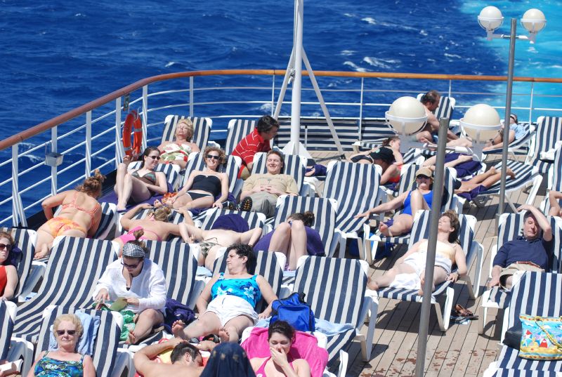Holly, Martha, and Kevin relaxing by the Sea View Pool on the Lido Deck