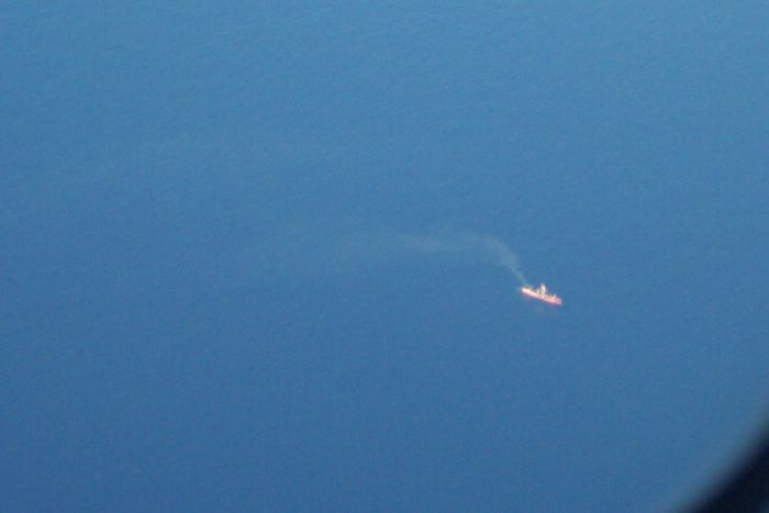 This ship off the coast must have been quite large. Others appeared as no more than dots, looking more like buoys than boats.