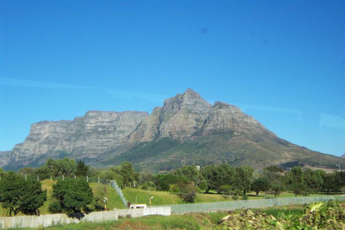 More greenery is now visible at the base of the mountain.
